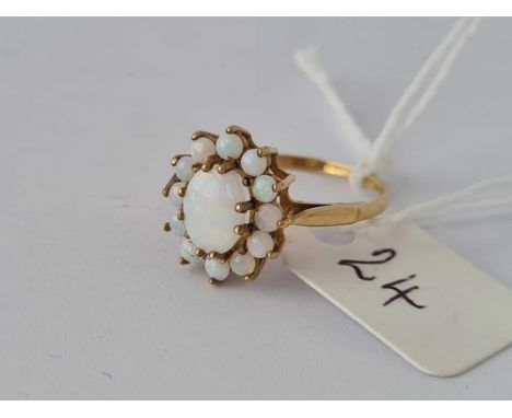 A opal cluster ring 9ct size O      1.8 gms