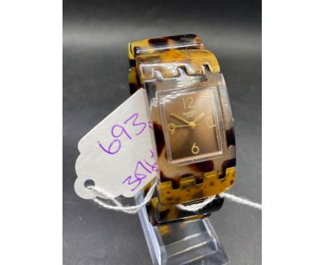 A unusual ladies swatch wrist watch