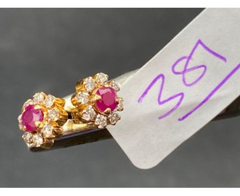 A pair of fine ruby and diamond cluster earrings 18ct gold