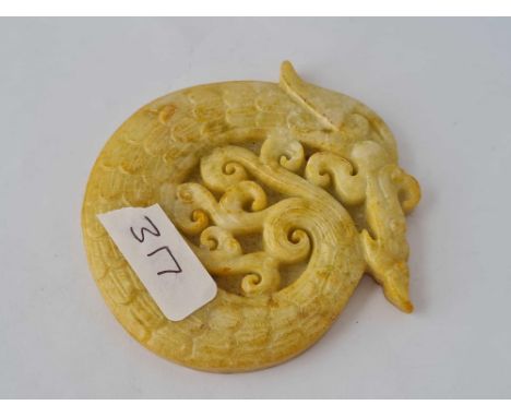 A Chinese jade dragon disk