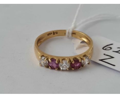 A ruby and diamond half hoop ring 18ct gold size O   2.6 gms