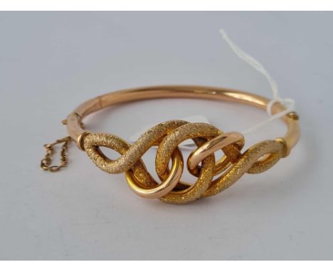 A KNOT BANGLE 9CT 10.3 GMS