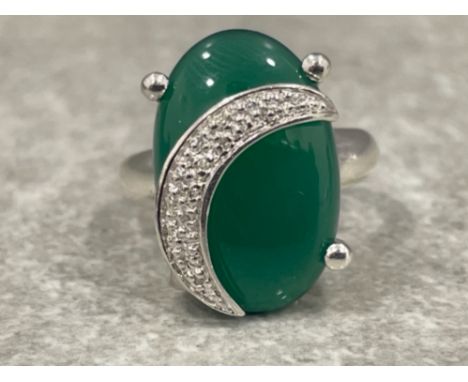 Ladies silver and Diamond oval green stone set ring. 8.2g size N1/2