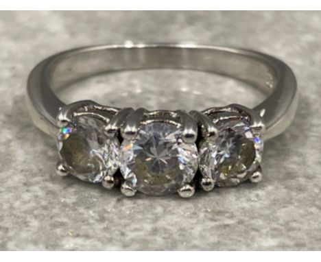 Ladies silver and 3 stone CZ ring. size O