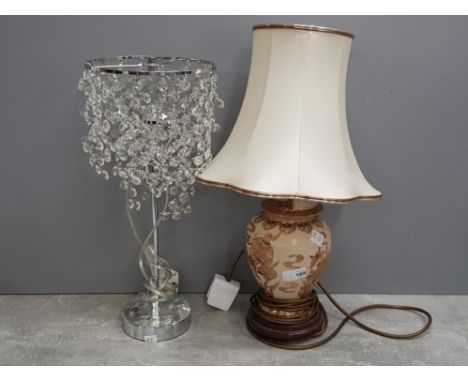 Tubelined ginger jar table lamp with shade with oriental design together with a chrome crystal chandelier type table lamp