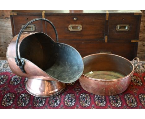 A Victorian copper coal helmet, to/w a copper and brass preserving pan (2) 