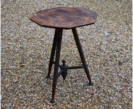 A provincial octagonal side table on ring turned stained beech base, 55 cm wide x 70 cm high 