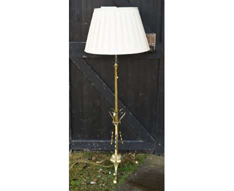 A Victorian brass telescopic tripod oil lamp stand, later wired for electricity, for re-wiring 