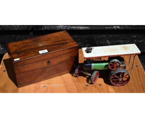 A 19th century mahogany tea caddy, 29 cm wide, to/w a Mamod steam tractor (2) 
