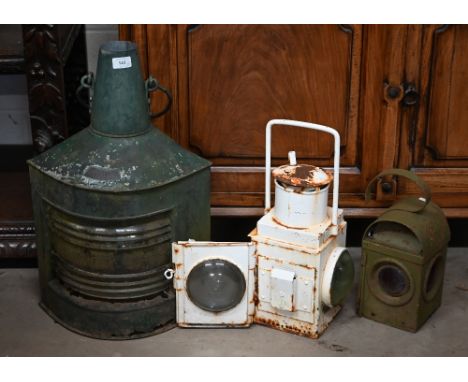 A large vintage Scandinavian tin 'Styrbord' (sic) ship's lamp 58 cm high (a/f) to/w a white-painted railway-style lamp (unmar