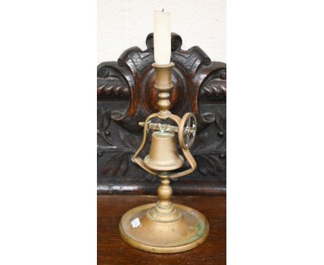 A 19th century brass tavern candlestick with bell, 28 cm high 