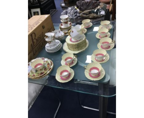 LIMOGES PART TEA SERVICE, with rose motif decoration, along with two other part tea services (3)