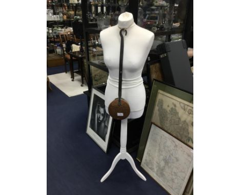 MODERN MANNEQUIN, on tripod supports, along with a copper chestnut roaster