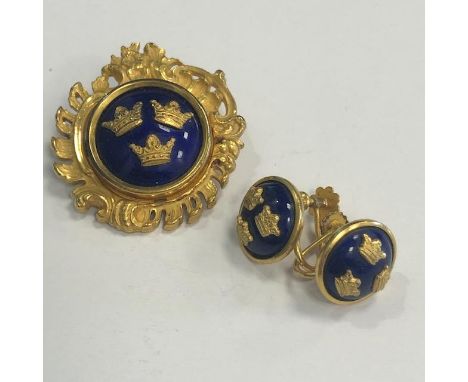 YELLOW METAL AND BLUE ENAMEL BROOCH AND EARRINGS BY SPORRONG &amp; CO, decorated with the coat of arms of the kingdom of Swed