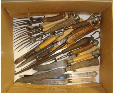 Box of vintage horn handled carving sets