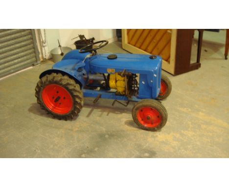 Vintage miniature tractor, Trojan Toraktor with Clinton 98 cc engine, with associated paperwork including manuals etc. 