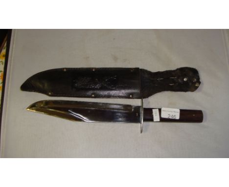 Vintage Original Bowie Knife Whitby with polished blade, wooden handle in tooled leather sheath decorated with stag blade len