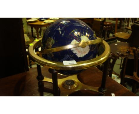 Modern globe inset with semi precious stones