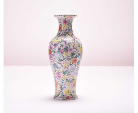 A Chinese famille rose ‘thousand flower’ vase, Qianlong seal mark but Republic periodOf baluster form and decorated with an a