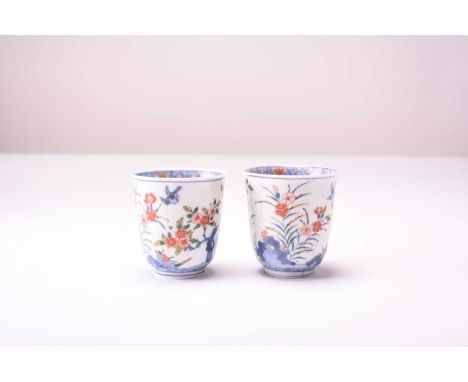 A pair of Chinese Wucai wine cups, Qing Dynasty, 18th centuryDecorated in underglaze blue and enamel colours with rocks and f