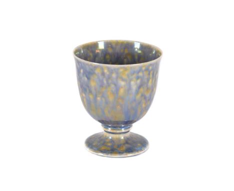 A RUSKIN POTTERY LOW-FIRED LUSTRE 'DELPHINIUM BLUE' GOBLET DATED 1924 with streaked mottled blue and orange glazes impressed 