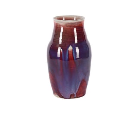 A LARGE RUSKIN HIGH-FIRED VASE  DATED 1924 the slightly ribbed body with liver red-streaked lavender glazes impressed marks '