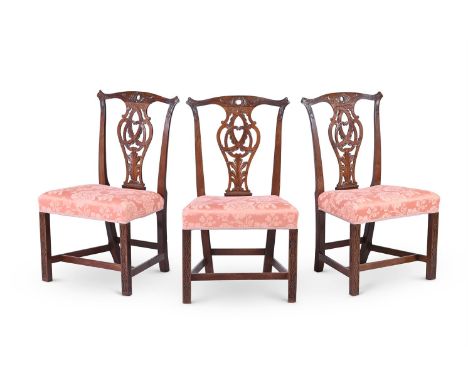 A SET OF THREE GEORGE III CARVED MAHOGANY CHAIRS  IN THE MANNER OF THOMAS CHIPPENDALE, THIRD QUARTER 18TH CENTURY each 97cm h