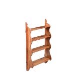 A FLIGHT OF VICTORIAN MAHOGANY WALL SHELVES