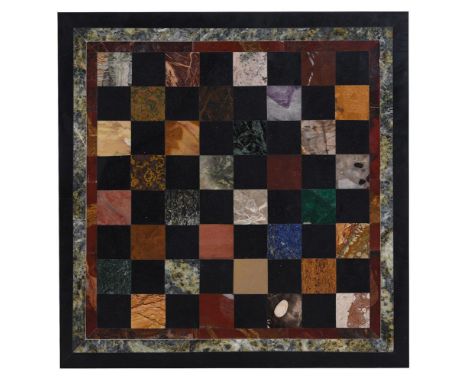 A BLACK SLATE SPECIMEN MARBLE INLAID TABLE TOP  20TH CENTURY With inset chess board pattern, the black squares uniform the 'w