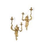A PAIR OF LOUIS XV GILT BRONZE TWIN-BRANCH WALL LIGHTS MODELLED WITH DRAGONS