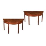 A PAIR OF GEORGE III MAHOGANY CONSOLE TABLES