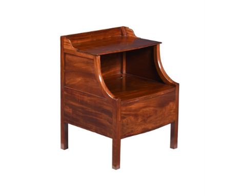 A GEORGE III MAHOGANY BEDSIDE COMMODE  CIRCA 1800 Of bowfront outline, with lift flaps, the lower flap concealing a compartme