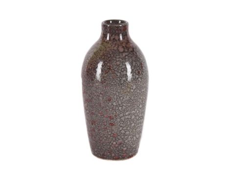 A RUSKIN POTTERY HIGH-FIRED VASE  DATED 1924 mottled in tones of crushed strawberry red with grey and black veining  impresse