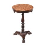 A REGENCY STAINED OAK AND SPECIMEN CROSS SECTION VENEERED OCCASIONAL TABLE