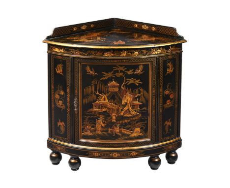 A BLACK LACQUER AND GILT DECORATED CORNER CABINET FIRST QUARTER 20TH CENTURY  84cm high  Condition Report:  Marks, knocks, sc