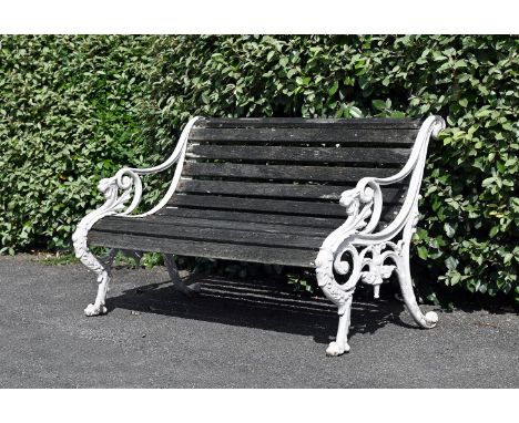 A WHITE PAINTED CAST IRON GARDEN BENCH  20TH CENTURY, IN THE MANNER OF COALBROOKDALE  With gryphon pattern monopodia supports