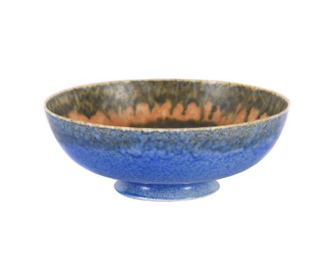 A RUSKIN POTTERY LOW-FIRED BOWL CIRCA 1927-1933 with mottled soufflé glaze in blue, orange and green impressed mark 'RUSKIN E