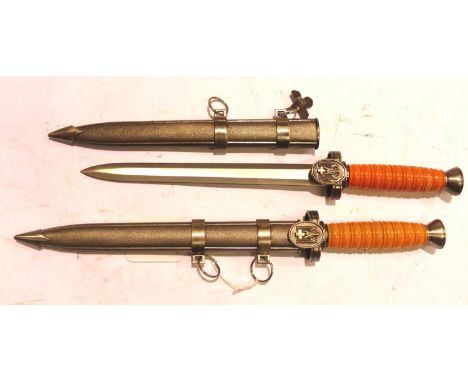 German WWI reproduction ceremonial dagger with scabbard. P&amp;P Group 2 (£18+VAT for the first lot and £3+VAT for subsequent