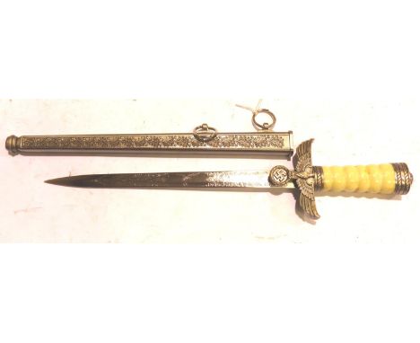 German WWI reproduction ceremonial dagger with scabbard. P&amp;P Group 2 (£18+VAT for the first lot and £3+VAT for subsequent