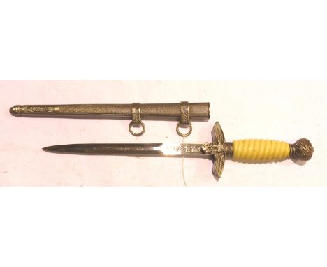 German WWI reproduction ceremonial dagger with scabbard. P&amp;P Group 2 (£18+VAT for the first lot and £3+VAT for subsequent