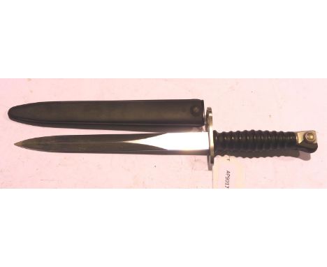 Post war Swiss SIG bayonet with plastic scabbard. P&amp;P Group 2 (£18+VAT for the first lot and £3+VAT for subsequent lots) 