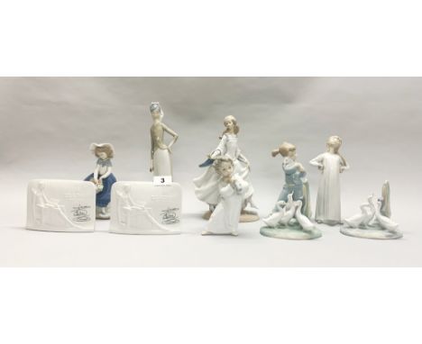 A group of five porcelain Lladro figures, one Nao by Lladro figure, two porcelain Nao figures and two Lladro collector's edit