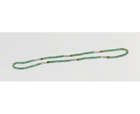 A pretty mixed colour jade single row necklace, L. 80cm.