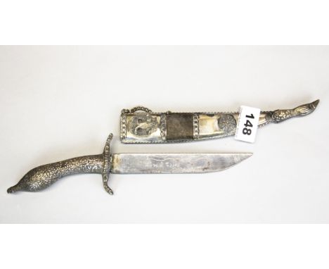 A white metal mounted Eastern dagger, L. 33cm.