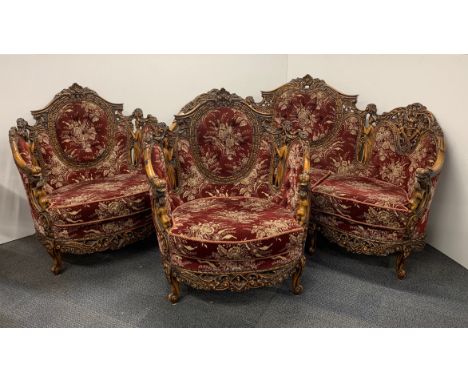 A superb hand carved and button backed three piece Palazzo salon suite, settee L. 188cm.