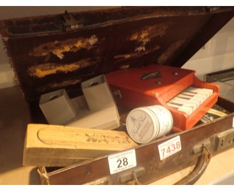 Vintage small suitcase containing mixed collectables including tins miniature piano dominoes Viewmaster postboxes etc 