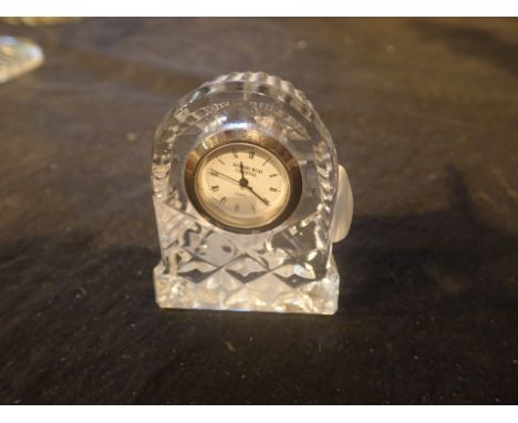 Miniature clock in glass
