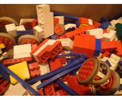 Box of vintage Lego pieces including windows wheels etc 