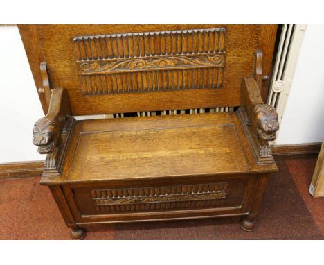 Early oak monks bench with lion masks arms rests