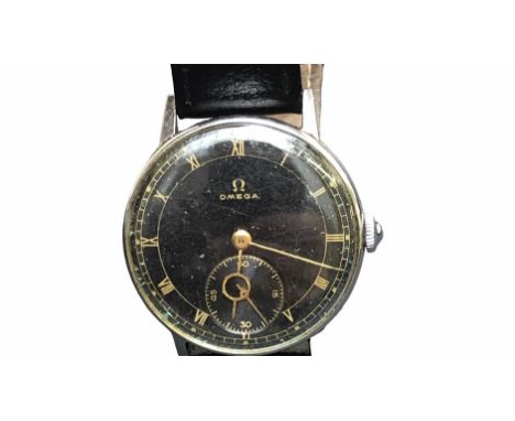 1940's Omega wristwatch wristwatch. Manual wind movement, black dial with sub second hand at 6 o'clock. Gold roman numerals, 